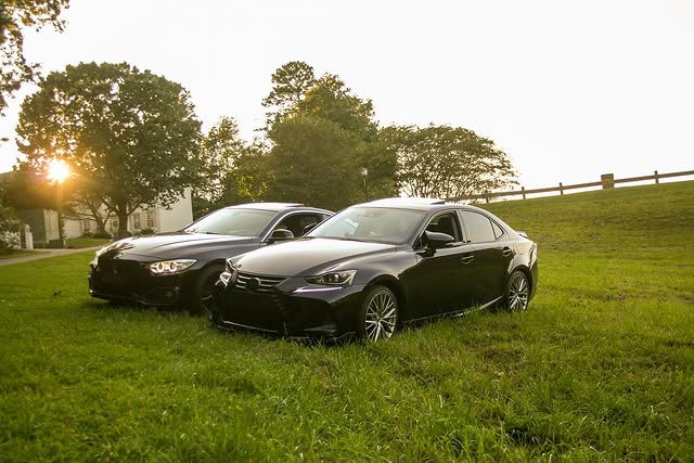 Luxury sedans at golden hour
